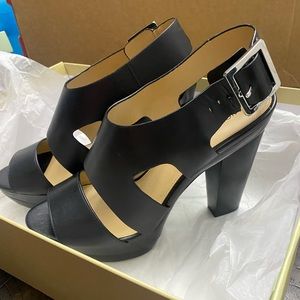 New in box , Michael Kors black leather ,Carla platform heels women’s size 8.5